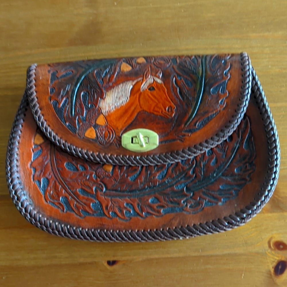 Leather tooled western purse.